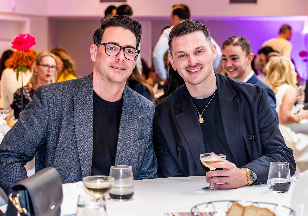 A couple of friends pose for a photo at the Yaffa Media &ndash; Ragtrader, Australian Fashion Industry Awards.
