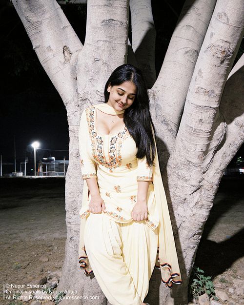 Elegant evening portrait featuring Nupur Ahuja in traditional Punjabi attire.
