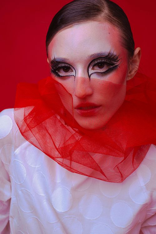 Portrait of subject with avant-garde styling, fashion photography by Mila Filippone.