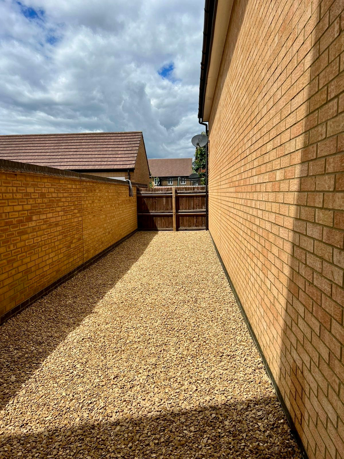 gravel installation, clear of weeds, alleyway, Peterborough