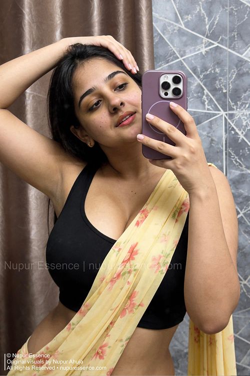Indian fashion portrait featuring Nupur Ahuja in a floral saree
