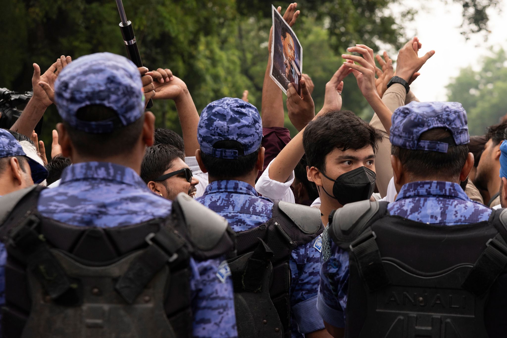 Supporters of India's Cockroach Janta Party (CJP) gather before a march to Parliament in New Delhi