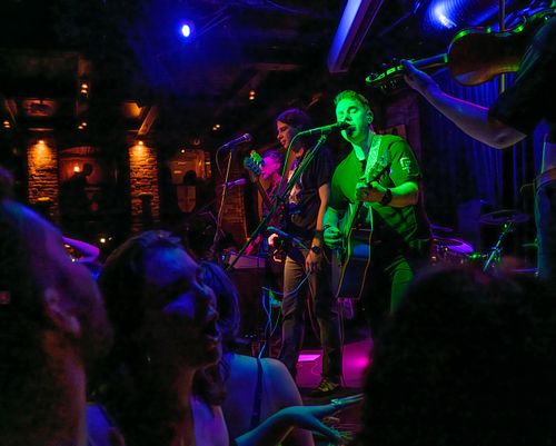 a candid photo of a band playing live music in the Blarney Stone in Vancouver