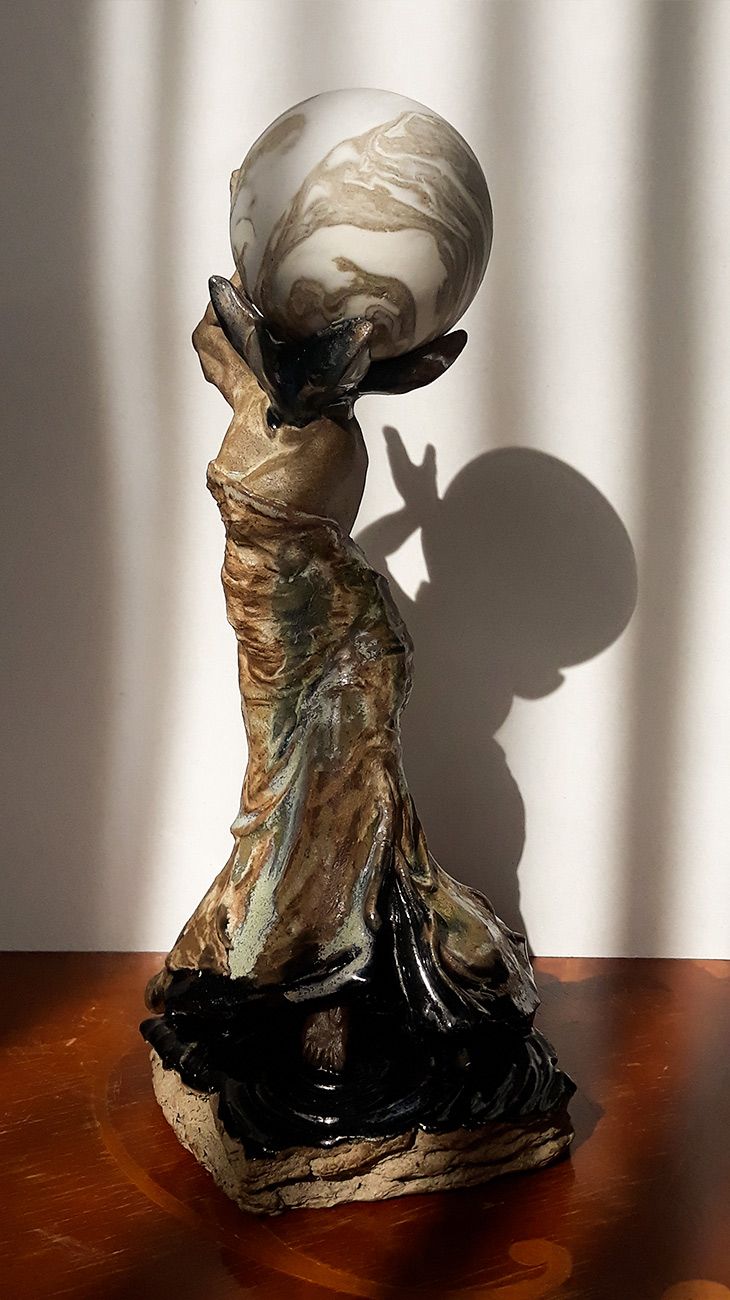 Hand-built ceramic sculpture of Aquarius (artist Nicolas Contr&eacute;ras Moons Project), showcasing a delicately enameled Venus with a porcelain moon replacing the head.