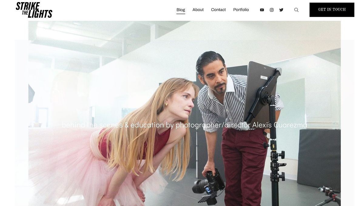 Strike the Lights blog design with a full-bleed hero and a mission-statement tagline