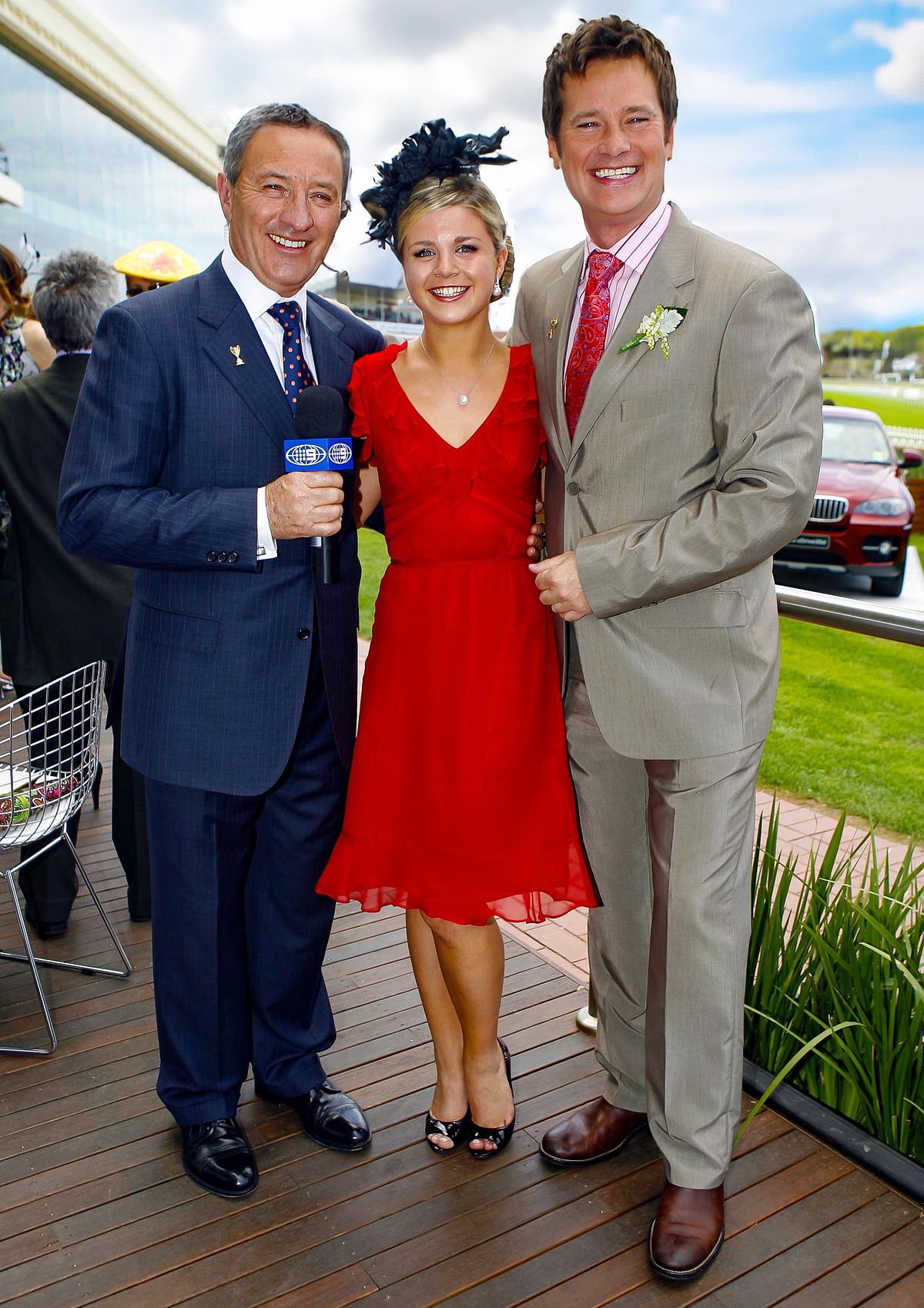 Ken Sutcliff, Emma Freedman and Richard Reid at the Caufield Race course on Caufield Cup day.