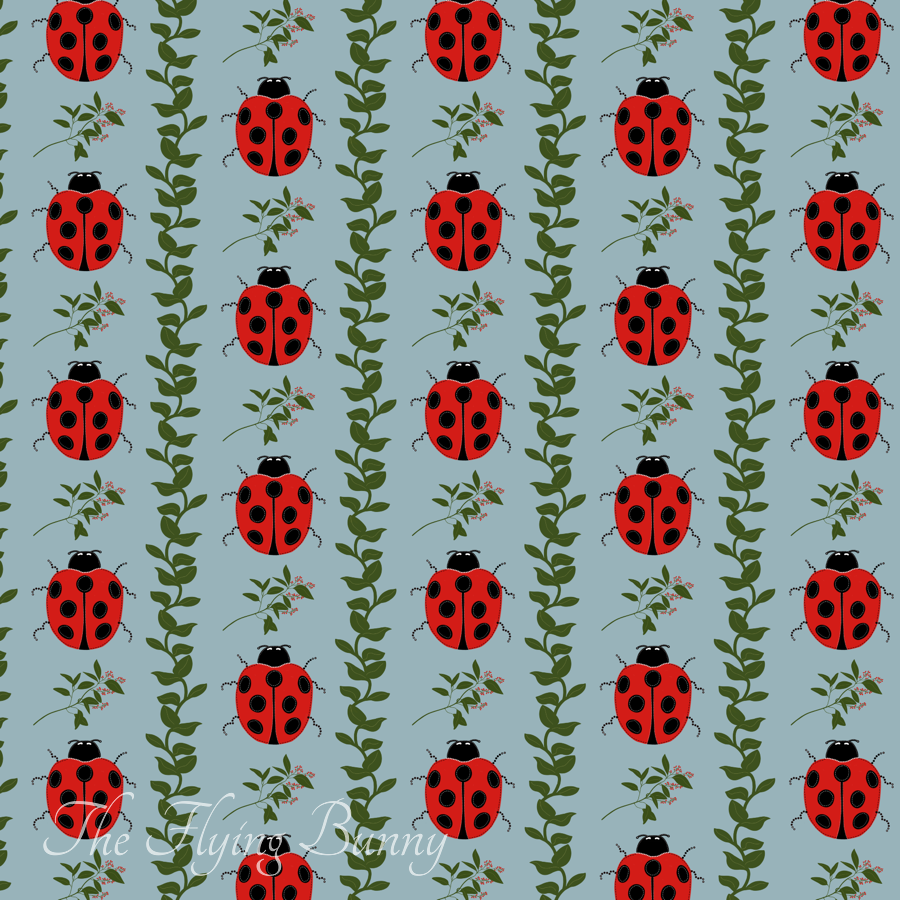 Bright red ladybugs with black spots arranged between leafy green vines and delicate floral sprigs on a soft gray-blue background in a repeating nursery pattern.