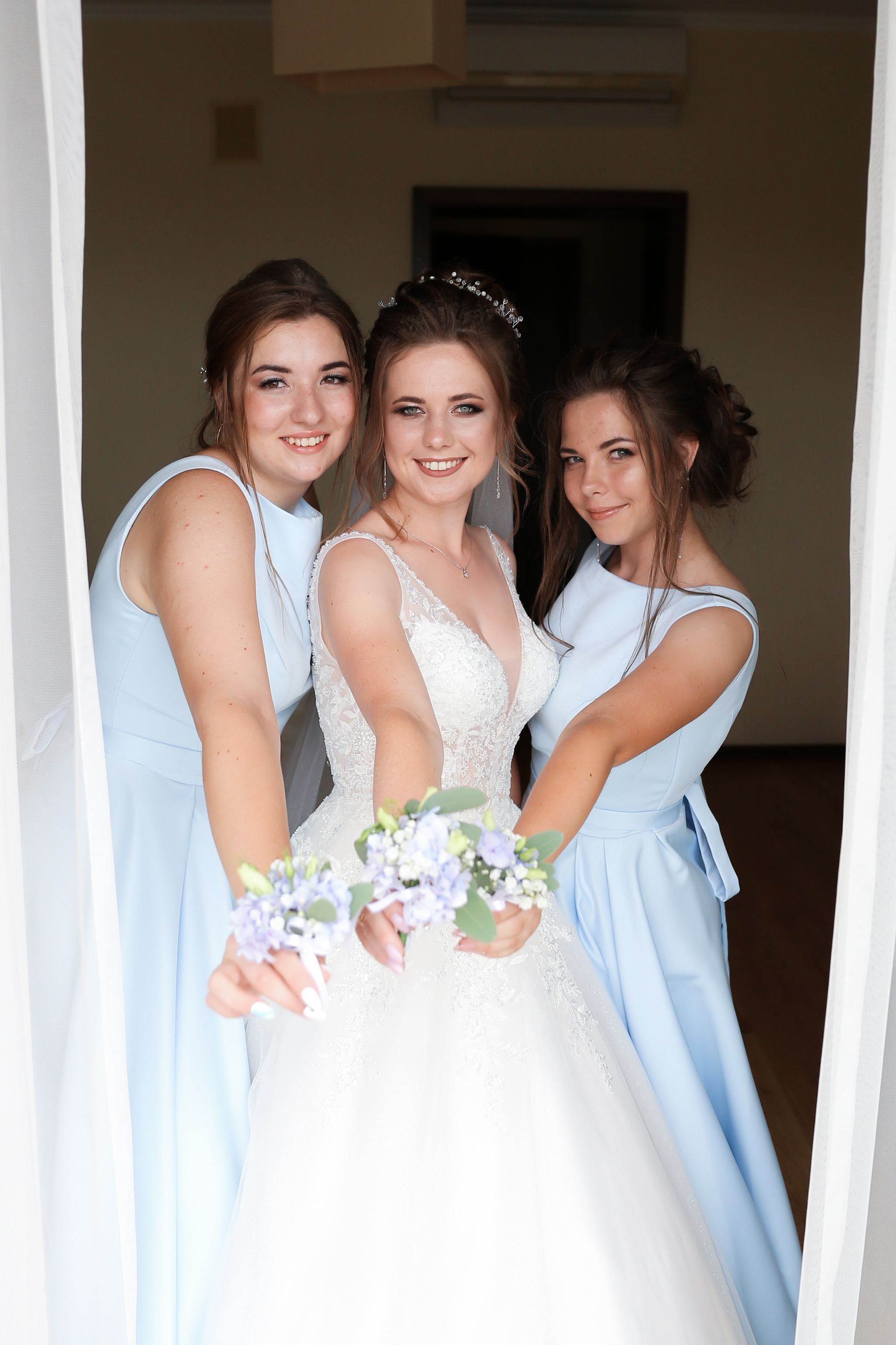 Bride with her bridesmaids before the wedding ceremony in Ukraine