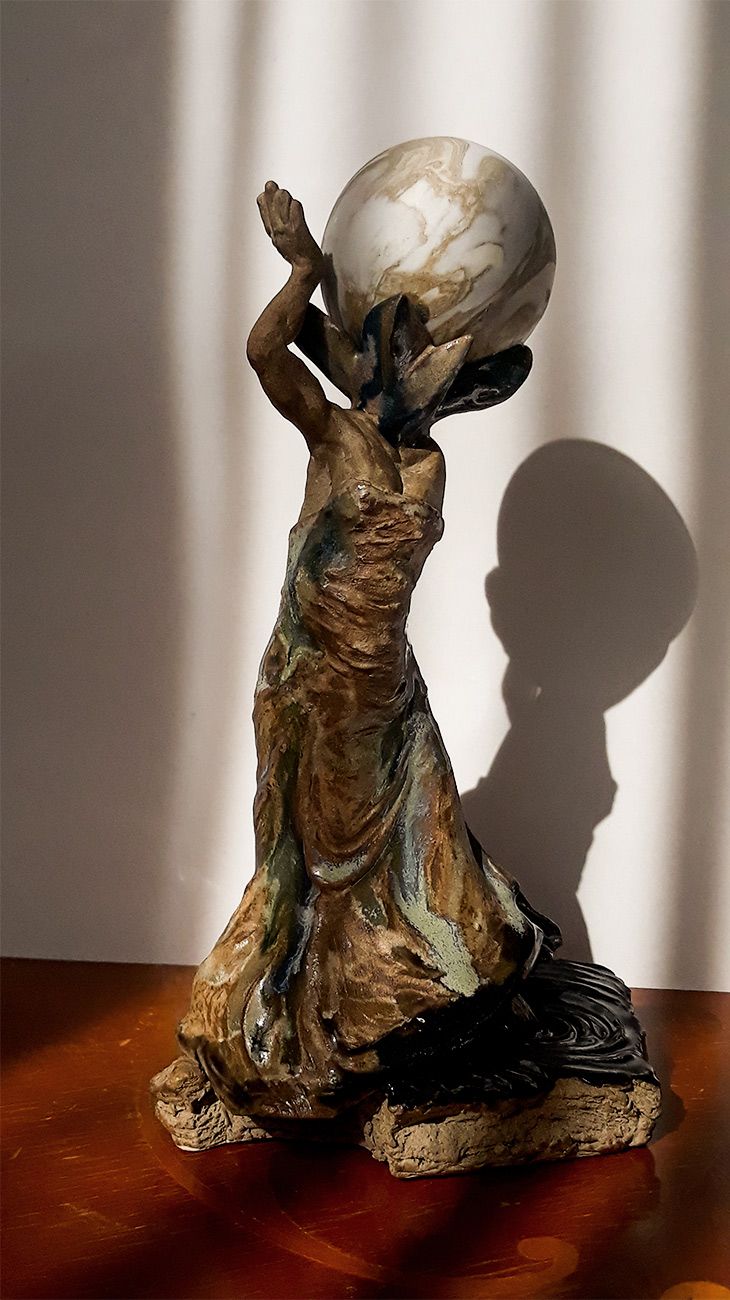 Hand-built ceramic sculpture of Aquarius (Verseau) from the Moons Project, showcasing a delicately enameled robe and sensual details. Crafted by Paris-based artist Nicolas Contr&eacute;ras.