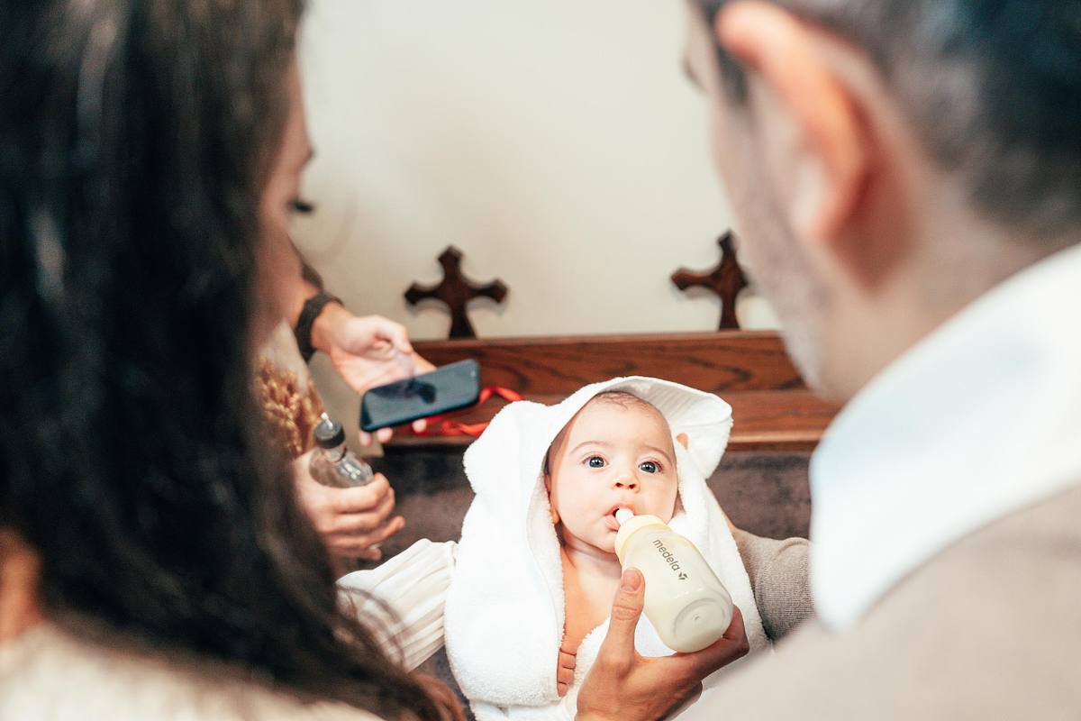 baby baptism ceremony at Ottawa church captured by Kameel Photography
