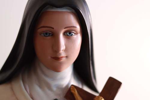 A beautiful picture of the St. Therese statue's face after total restoration.  Ready to go back to St. Joseph Catholic Church in Somerset, Ohio.