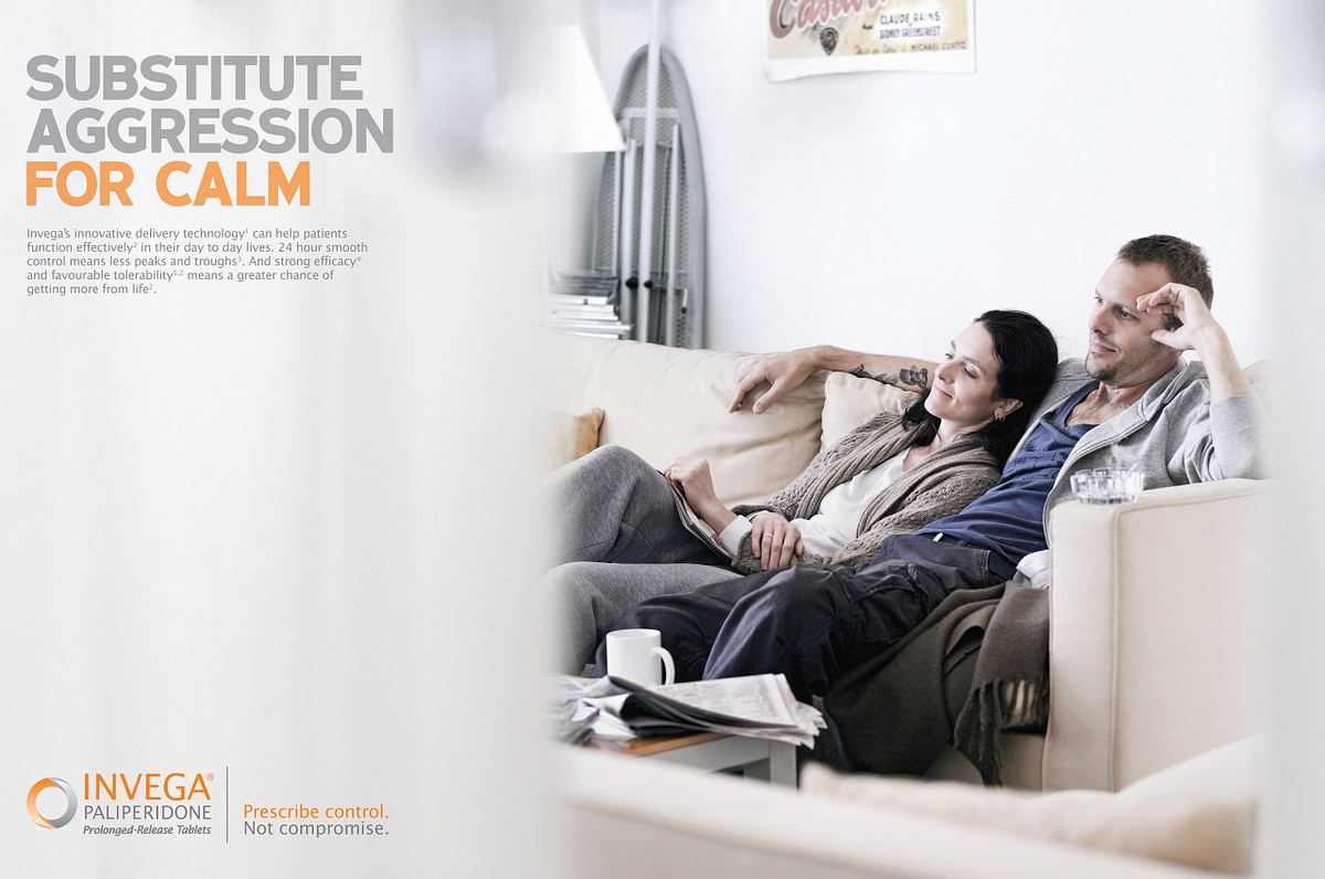 Couple on a couch getting along for a Health Care advertising campaign