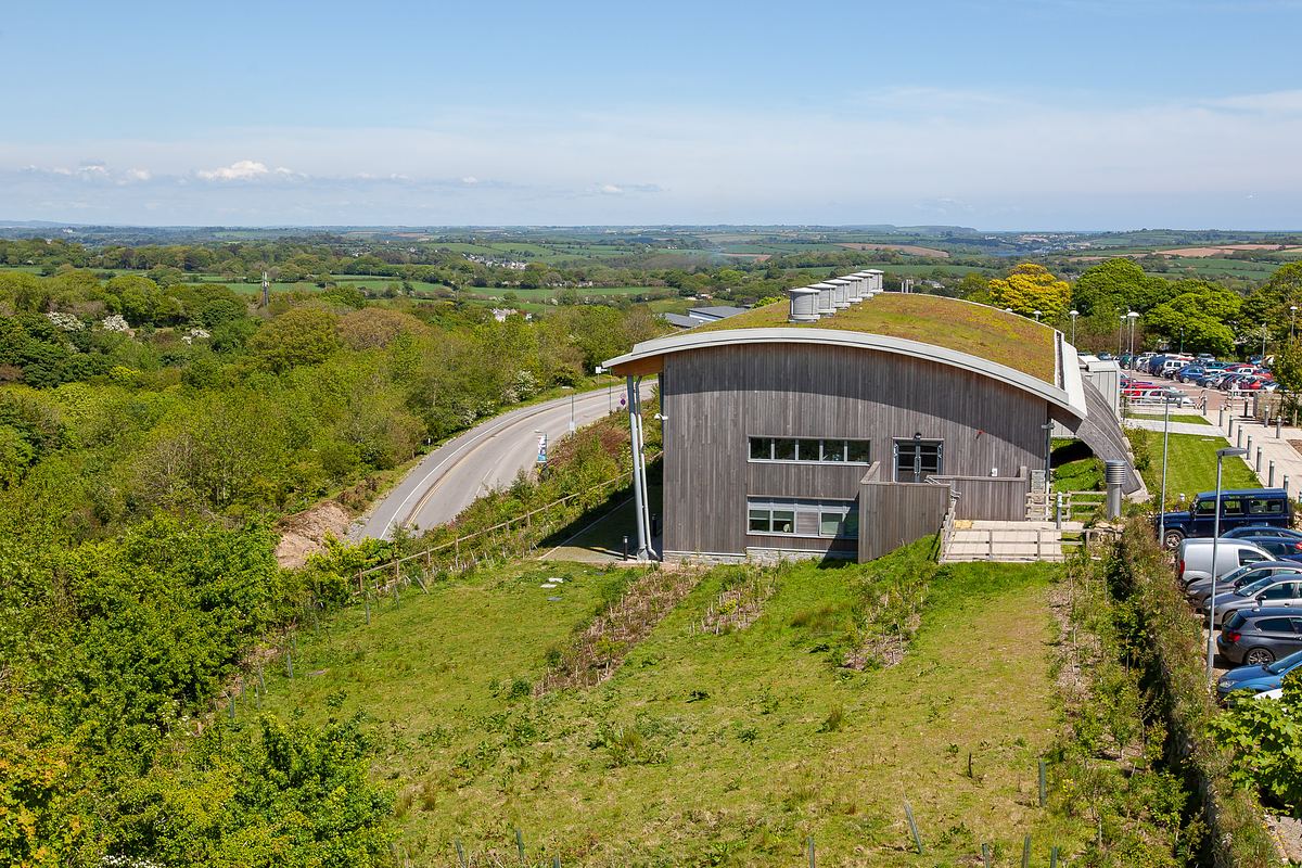 Cornwall architecture photograph of the AIR building at Tremough Campus with curved green roof design.