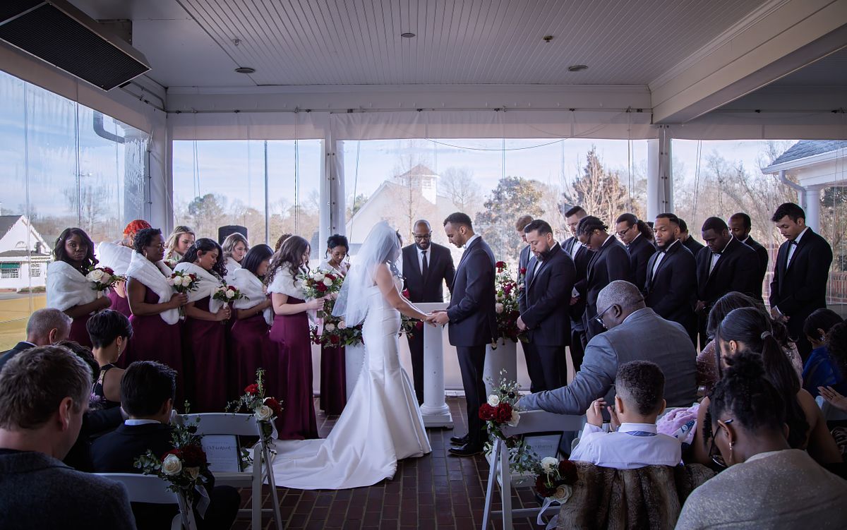 unplugged wedding ceremony at baywod weddings, the brde and groom exchanging vows with everyone watching
