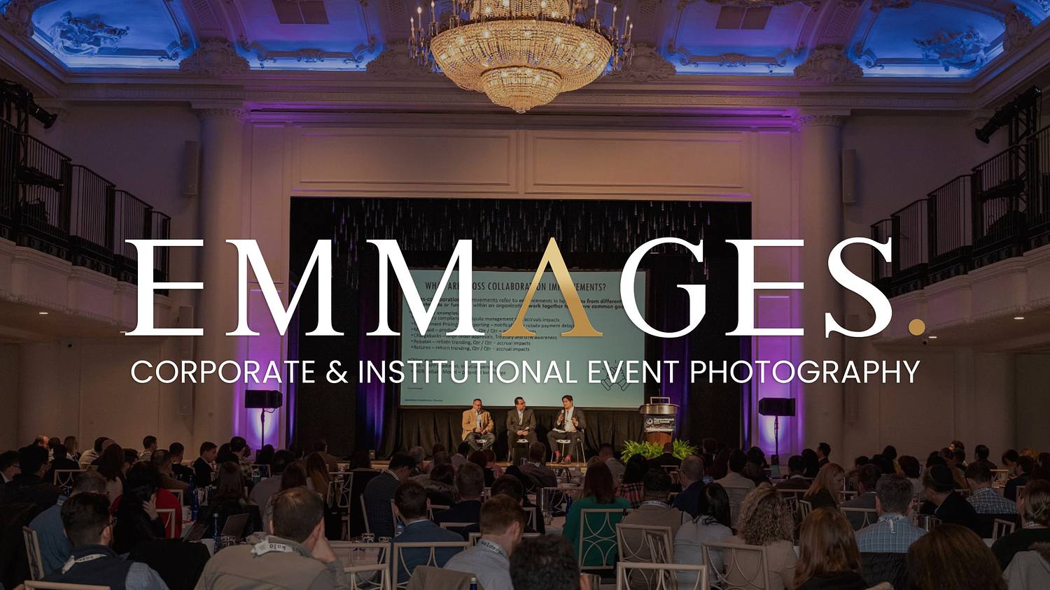 Corporate conference audience and leadership panel discussion inside a large ballroom event venue, photographed by Philadelphia corporate event photographer Emmages