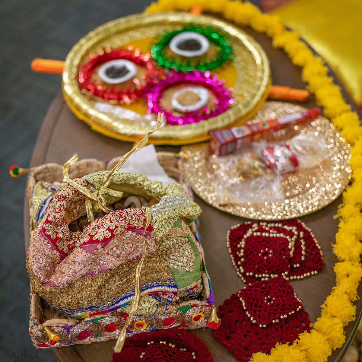 colorful tray of gifts at a traditional mehndi wedding in bridgeville, de confrence center