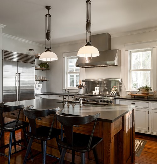 Kitchen vignette with arts and crafts furniture, styling, and custom black light pendants. Avondale Jacksonville, Florida.