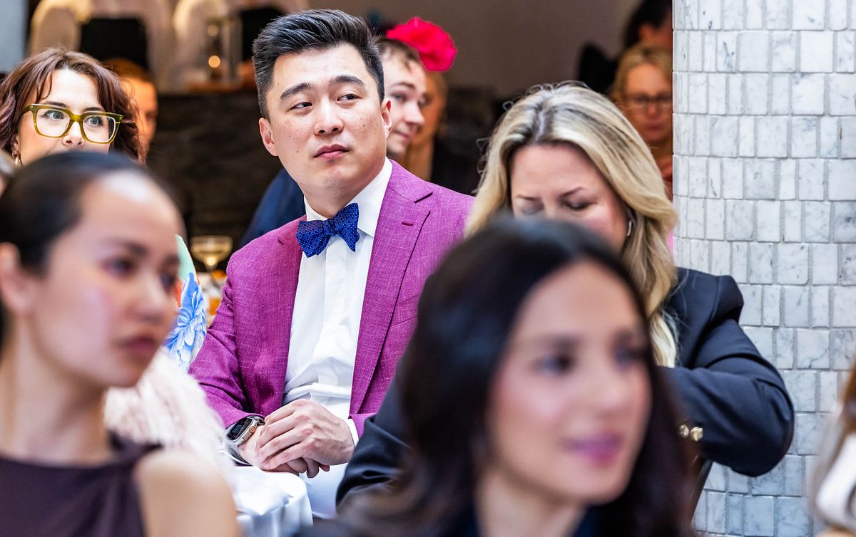 A gentleman watches proceedings at the Yaffa Media &ndash; Ragtrader, Australian Fashion Industry Awards.
