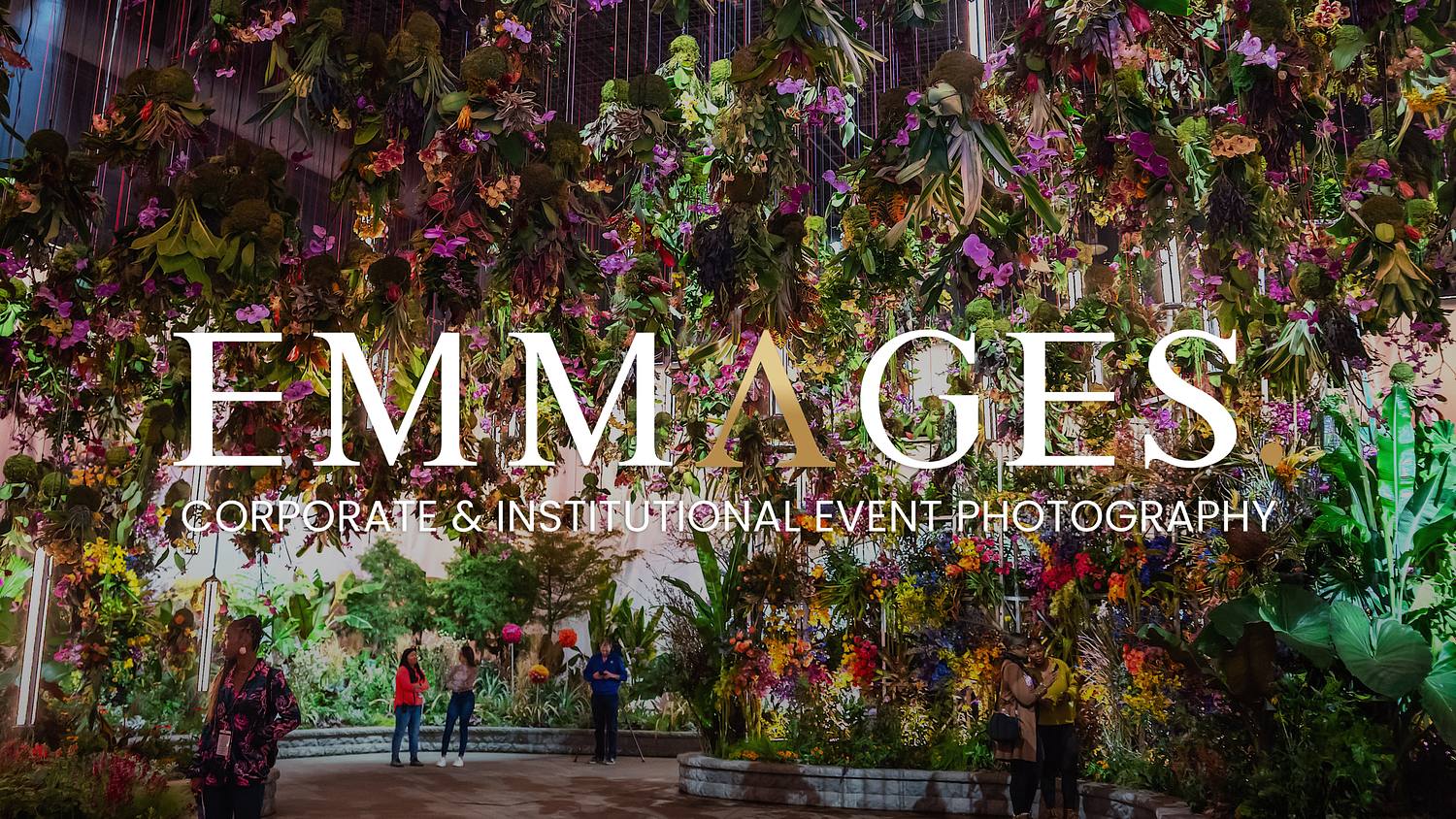 Philadelphia Flower Show installation at the Pennsylvania Convention Center, featuring a large suspended floral display and visitors exploring the immersive exhibition space.