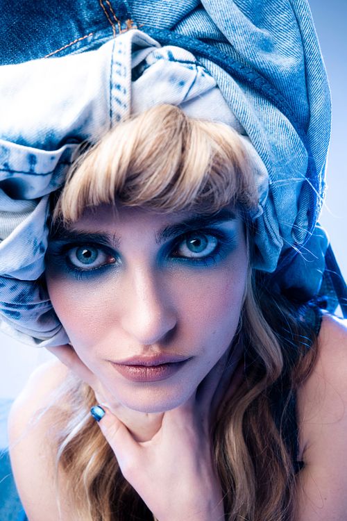 Portrait of subject with avant-garde styling, fashion photography by Mila Filippone.