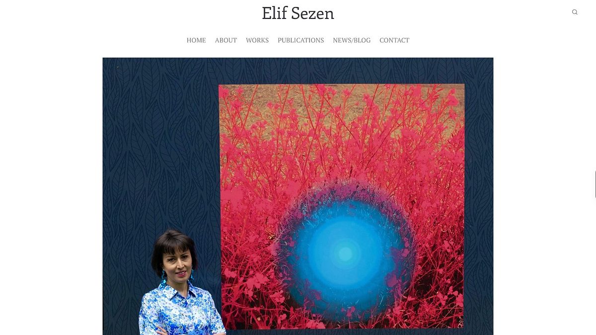 Elif Sezen author website design placing the author inside a vivid navy hero composition