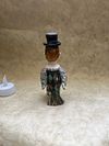 Spring bird with hat, ceramic mini-sculpture