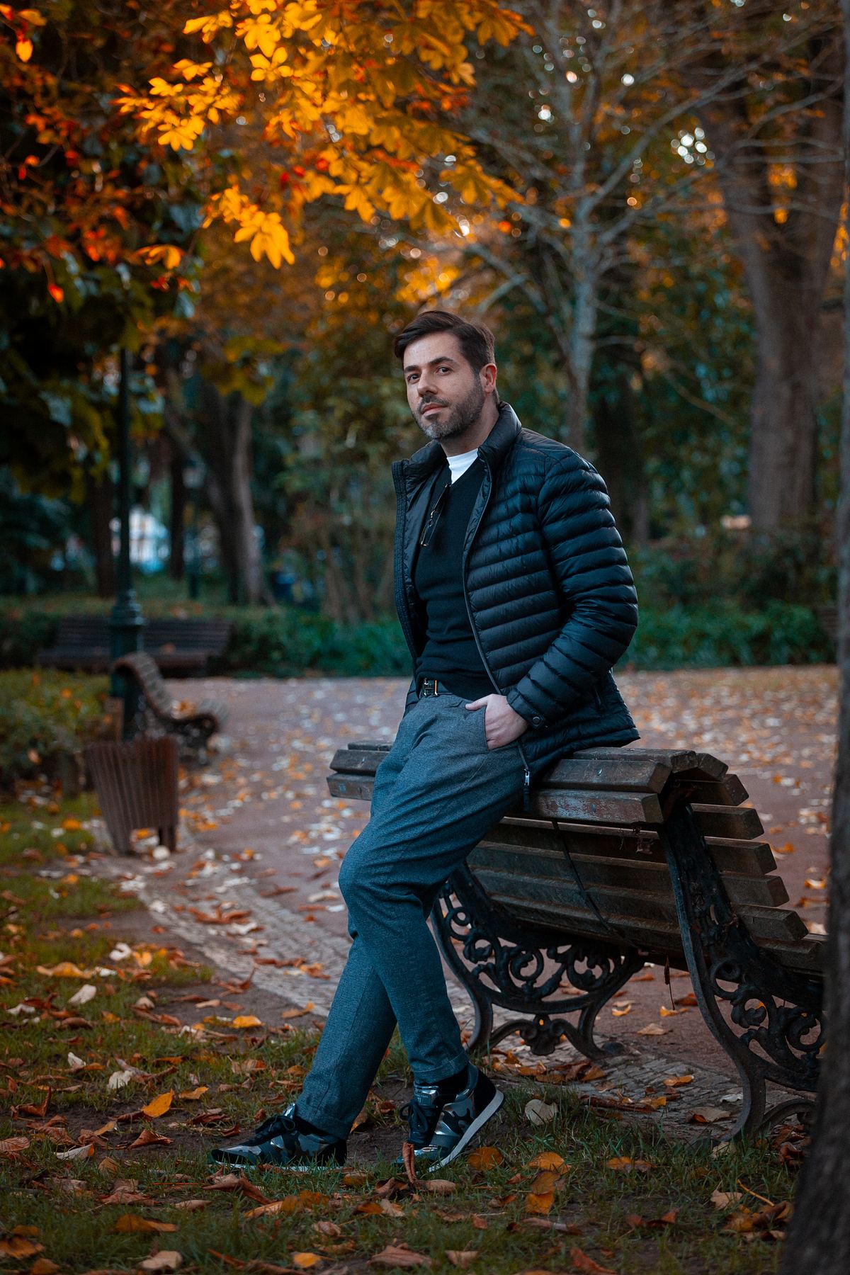 Male portrait in an autumn park in Lisbon