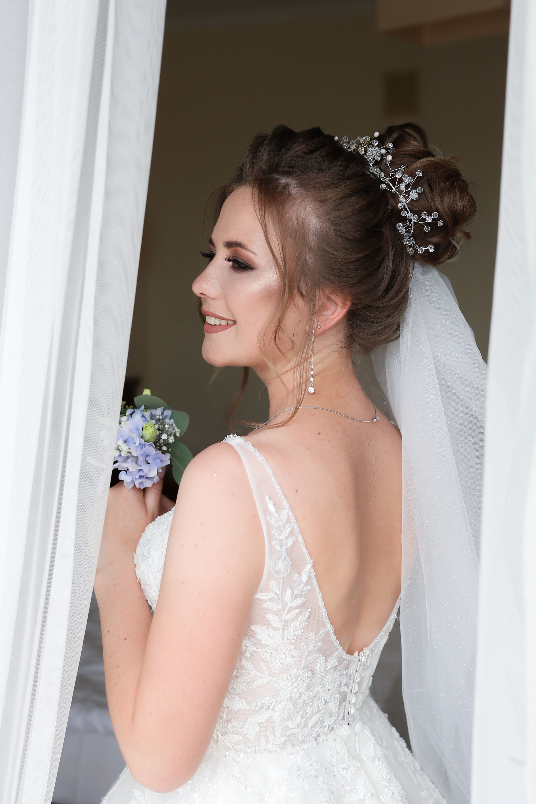 Elegant bridal portrait during wedding morning preparations in Ukraine
