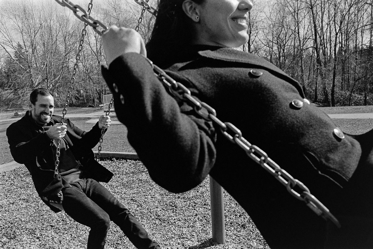 couple having fun at the playground shot on 35mm film