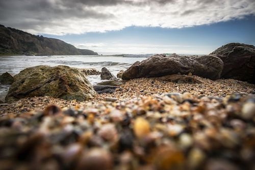 Seascapes, ocean, waves, shores, sand, rocks, surf, clouds, sky, travel, nature, landscape, seaside, beach, Dunedin, Otago, South Island, New Zealand, shells, cone, pebbles, Aramoana