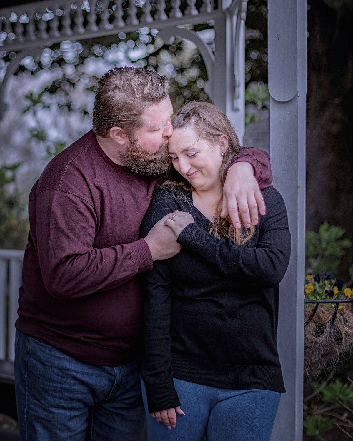 engagement photos of a couple posing in Lewes delaware