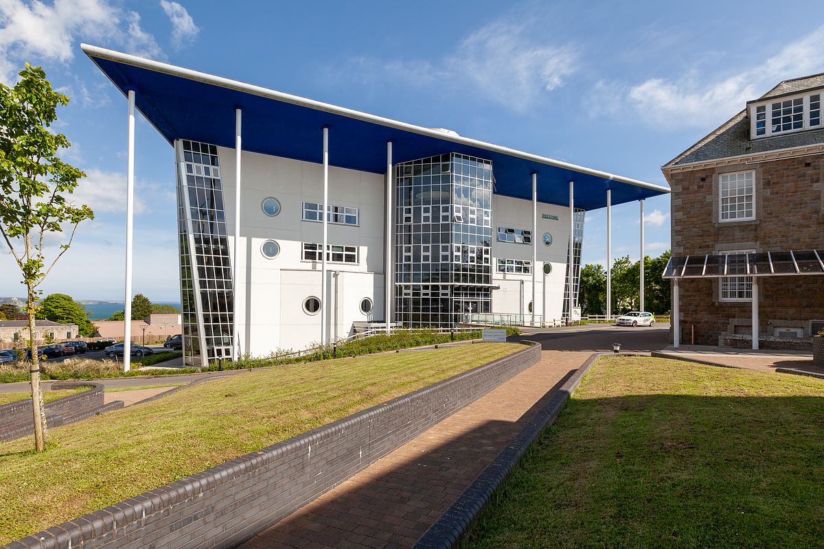 Penwith College Cornwall modern architecture with angled roof and glass frontage.