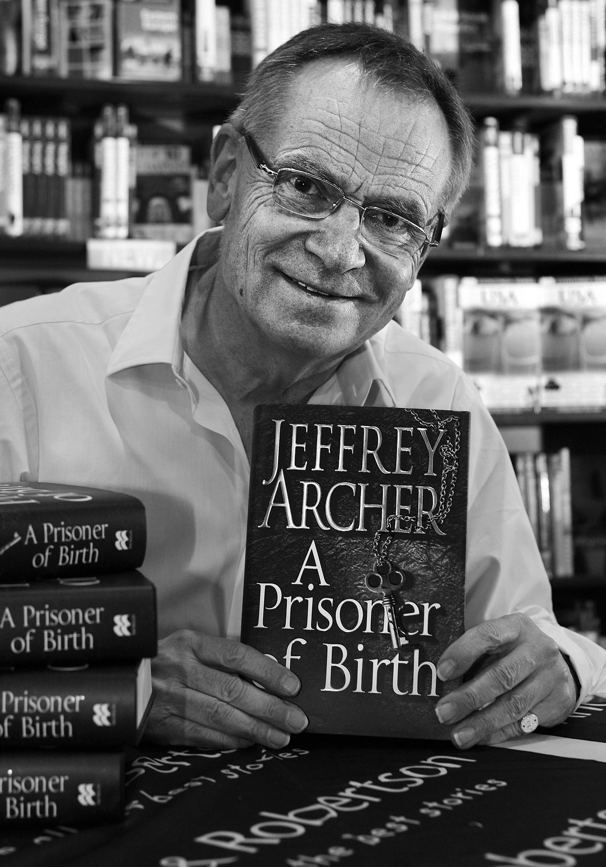 Former British Peer and author Jeffrey Archer, signs copies of his new book 'Prisoner of Birth' at the Angus and Robertson bookshop in Melbourne.