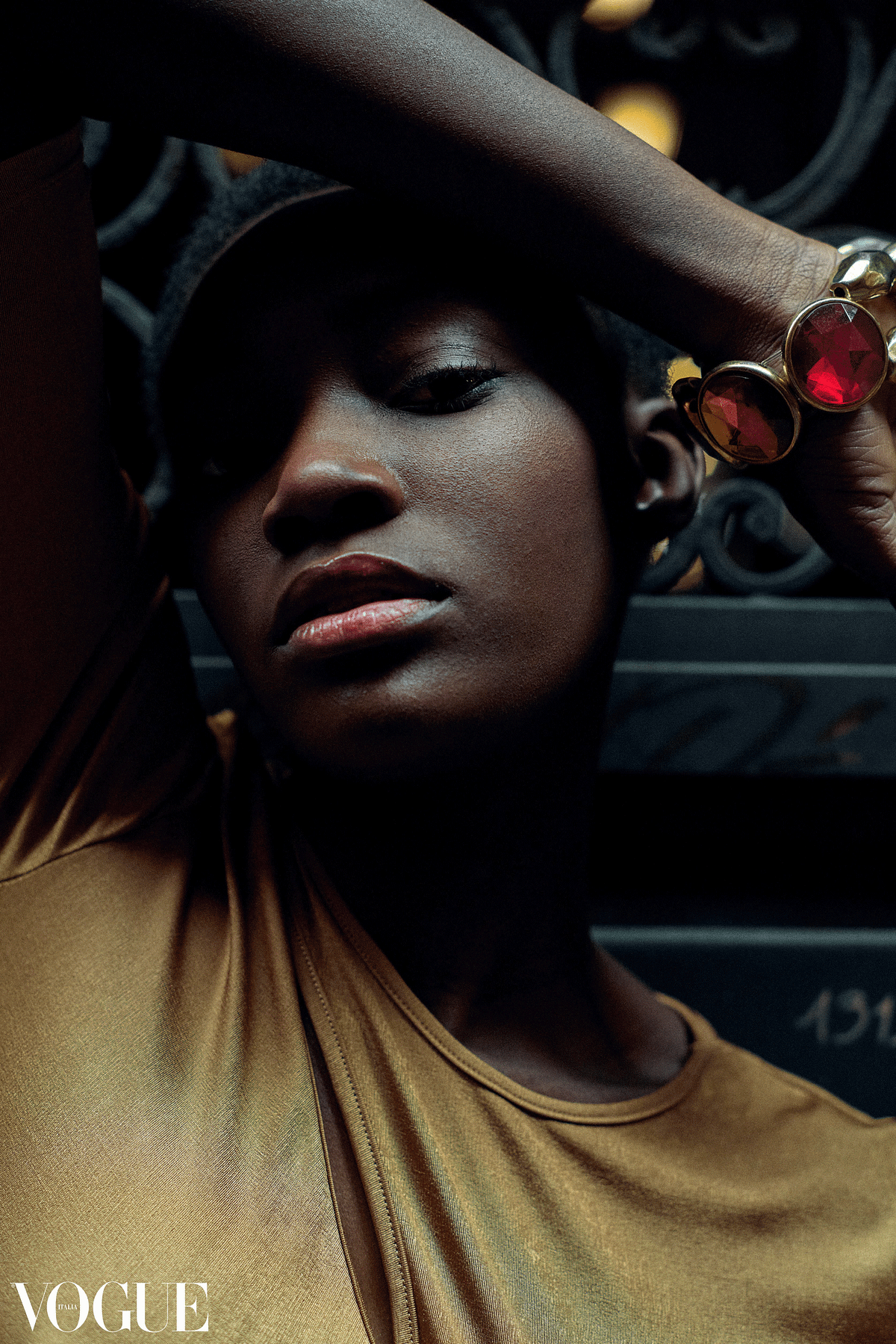 Selected for Photo Vogue Italia online portfolio as part of the Ethnia series. A beauty portrait of a woman with afro hair shot in warm and rich saturated tones by Gabriel Matula.