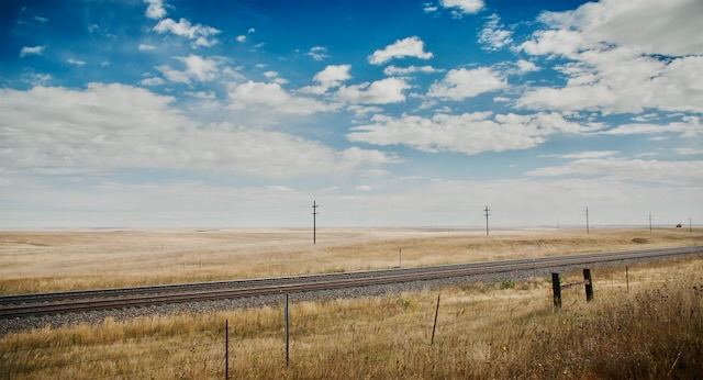 American railroad tracks with big sky