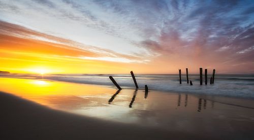 Skies, sunrise, sunset, Saint Clair, surf, ocean, waves, beach, Dunedin, New Zealand, South Island, Pacific, dawn, dusk, vast, travel, nature, landscape, clouds, sun rays, adventure