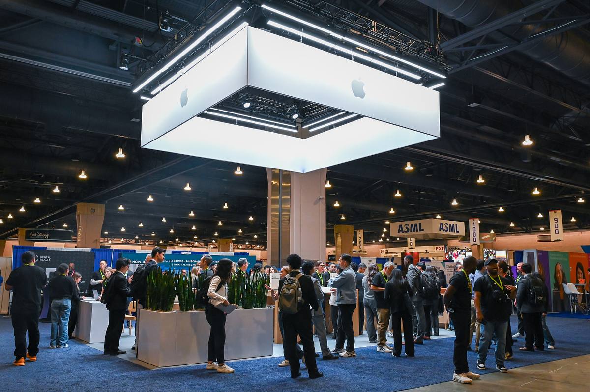 Attendees engage at the Apple brand activation during the SHPE National Convention 2025 career fair.