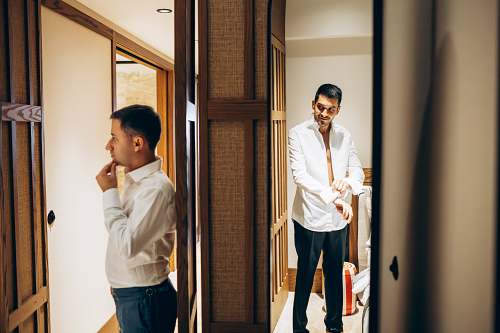 Candid groom preparation moment in Yalikavak