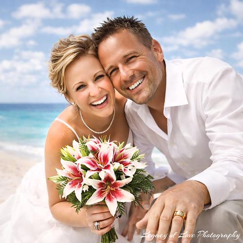 Sunset Beach Wedding Portrait: A Smiling Newlywed Couple on the Florida Coast