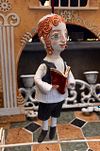 Traditional boy with a book, little ceramic hanging sculpture