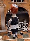 Traditional boy with a book, little ceramic hanging sculpture